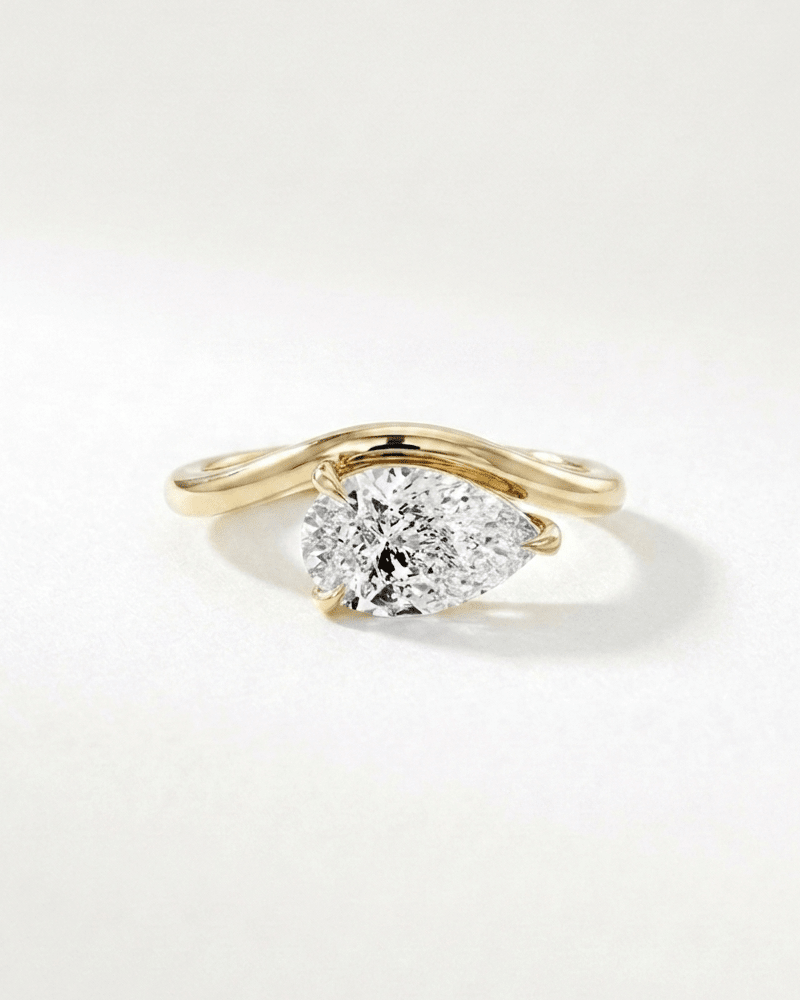 Zirconia Pear Cut Curved Ring - WSOPHIA